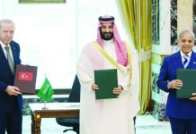 Saudi Arabia, Turkey and Pakistan sign joint defense pact Turkish President Tayyip Erdogan, Saudi Crown Prince Mohammed bin Salman and Pakistan's Prime Minister Shehbaz Sharif pose after signing a joint defenSe agreement in Mecca, Saudi Arabia. REUTERS