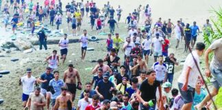 Young migrant men from Morocco are seen emerging from the waters to reach Ceuta, a Spanish territory in North Africa. They want to enter Europe. BBC