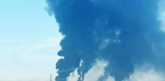 Huge plumes of smoke seen rise in the skies from the site where the Slavneft-Yanos oil refinery in Russia is located. TELEGRAM/CRIMEANWIND