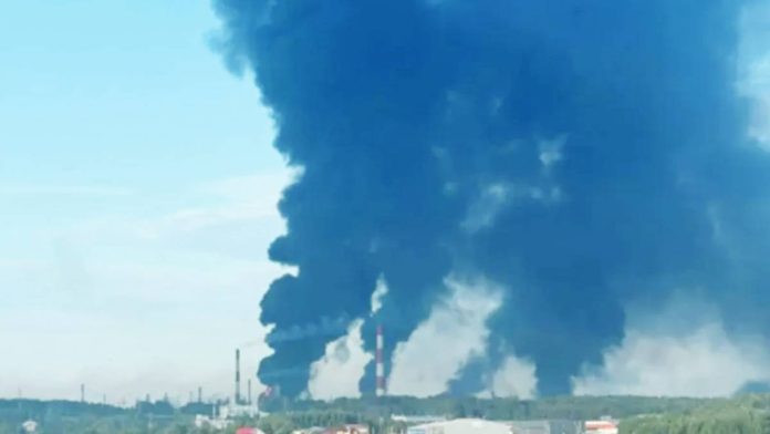 Ukraine Huge plumes of smoke seen rise in the skies from the site where the Slavneft-Yanos oil refinery in Russia is located. TELEGRAM/CRIMEANWIND