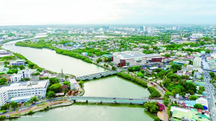 CITY OF PROGRESS. On August 25, Iloilo City marks its 89th Charter Day, celebrating nearly nine decades of development. Its thriving skyline and the iconic Iloilo River — one of the cleanest rivers in the country — stand as enduring symbols of a city moving forward toward “A Better Iloilo City for All.” PHOTO CREDIT: SHERWIN BALAJADIA BACHOCO