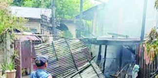 Officers of the President Roxas Municipal Police Station responds to the scene of a fire that destroyed a two-story house and damaged an adjacent home in Sitio Dupaks, Barangay Poblacion, President Roxas, Capiz, on Wednesday afternoon, August 19, 2026. PHOTO COURTESY OF DYVR RMN ROXAS 657 KHZ/FACEBOOK