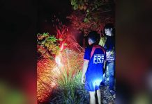 Firefighters from the Bureau of Fire Protection-Bugasong monitor flames during a grassfire response in a mountainous area of Barangay Lacayon, Bugasong, Antique on Wednesday night, August 20, 2026. BFP-BUGASONG PHOTO