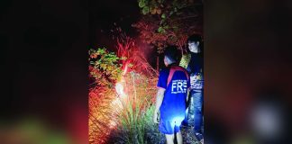 Firefighters from the Bureau of Fire Protection-Bugasong monitor flames during a grassfire response in a mountainous area of Barangay Lacayon, Bugasong, Antique on Wednesday night, August 20, 2026. BFP-BUGASONG PHOTO