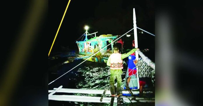 ime bantay dagat copy_compressed_superimposed Members of the Iloilo Provincial Bantay Dagat Task Force and police conduct a nighttime seaborne operation in northern Iloilo. Seven fishing boats were apprehended in separate operations in Concepcion and San Dionisio on Aug. 22 and 23 for alleged illegal fishing activities involving “baling” and trawl fishing. PHOTO FROM BALITA HALIN SA KAPITOLYO