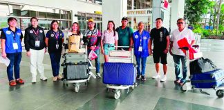 HOME SAFE. Three Ilonggo seafarers who survived the July 18, 2026 Russian drone attack on the M/V Inase in the Black Sea arrive at the Iloilo International Airport in Cabatuan, Iloilo on Wednesday, Aug. 5, where they are welcomed by government officials and their families following their successful repatriation from the conflict-hit region. PESO – ILOILO PROVINCE