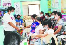 11,800 barangay health workers of Iloilo press for long-sought benefits FRONTLINE FORCE. Barangay health workers attend a meeting led by their provincial federation president Violeta Gicana (standing) at a local health station in Guimbal, Iloilo. More than 11,800 BHWs across the province stand to receive monthly benefits, hazard pay and other assistance under the Senate-approved Magna Carta of Barangay Health Workers. PHOTO COURTESY OF VIOLETA GICANA