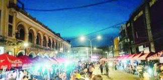 This August 28 to 30, 2026 more than 90 kiosks will transform Iloilo City’s Calle Real into a nighttime showcase of Ilonggo food, heritage, arts and homegrown businesses as part of Iloilo City’s 89th Charter Month Celebration. Photo shows a festive crowd filling Calle Real during the inaugural Iloilo City Night Market in 2024 as part of the Iloilo Charter Day celebration. MAI LADIAO/PN