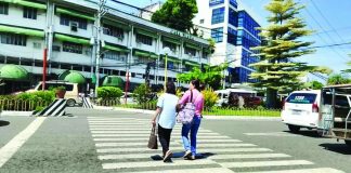 Faded pedestrian lanes put lives at risk; LTO-6 presses Public Works reg’l office to repaint crossings Road safety is also being compromised by pedestrian lanes whose markings have become so faded that motorists may have difficulty seeing them from a distance, according to the Land Transportation Office. Photo shows pedestrians crossing a pedestrian late on Bonifacio Drive, Iloilo City. IME SORNITO/PN