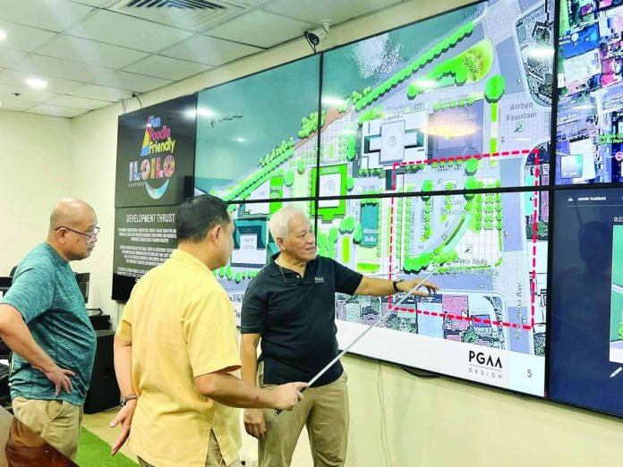 PROPOSED TRAFFIC MAKEOVER. Renowned Filipino architect Paulo Alcazaren presents the proposed reconfiguration of the Siete Pecados traffic islands in front of the Iloilo Provincial Capitol, a plan aimed at improving traffic circulation and creating a more pedestrian-friendly public space. The proposed site development plan envisions a roadside park and a more accessible and visually cohesive Capitol complex while adapting the historic area to contemporary urban needs. PHOTO COURTESY OF THE ILOILO PROVINCIAL GOVERNMENT