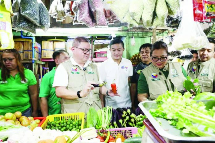 july_inflation_compressed_resized Food inflation remained steady at 5.3 percent, as lower meat prices and slower increases in vegetable prices offset sharper rice inflation.in July 2026. Photo shows officials from the Department of Trade and Industry and the Department of Agriculture conducting inspection at the New Las PiƱas City Public Market on August 4, 2026. DTI PHOTO