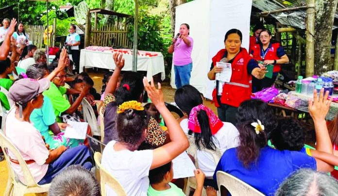 RIGHTS WITHIN REACH. Members of the Ati community in Bal-agon Sitio Gines, Barangay Badiang, Anilao, Iloilo actively participate in a Department of Social Welfare and Development-led community re-orientation on Indigenous Peoples’ and children’s rights, gender sensitivity and basic hygiene. The activity sought to equip Ati families with knowledge to better protect their rights, health and welfare. DSWD-6