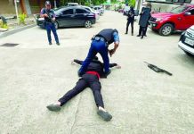 ‘RUN, HIDE, FIGHT’: DepEd drills for worst-case school attack PINNED TO THE GROUND. A policeman immobilizes and disarms an “active shooter” at the Department of Education - Region 6 compound in Iloilo City during a full-scale Active Shooter Incident Awareness, Response, and Simulation Exercise. The drill tested coordinated law enforcement, medical, and evacuation procedures to strengthen preparedness for potential active shooter incidents in schools and government workplaces. DEPARTMENT OF EDUCATION – REGION 6