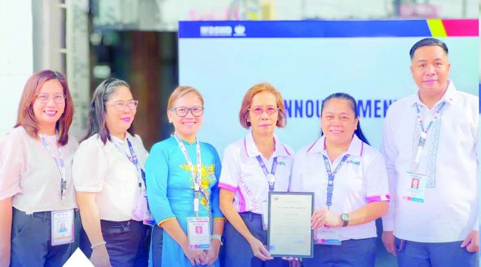 neljoy_child_care_cert_copy_compressed_resized CERTIFIED FOR QUALITY CHILD CARE. Officials of the Department of Social Welfare and Development – Region 6 and the Regional Adoption and Child Care Office gather after the formal turnover of the National Authority for Child Care (NACC) Certificate of Recognition to the DSWD-6 Home for Girls in Cabatuan, Iloilo. The certification confirms that the residential facility has met national standards for adoption and alternative child care services, making it one of only three accredited Child Caring Agencies in Western Visayas. RACCO-6
