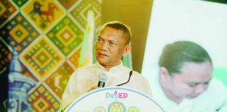 Regional Director Cristito Eco of the Department of Education in Western Visayas presents the state of basic education in the region during the Regional Assembly of Education Leaders in Iloilo City, highlighting a three-year decline in gross enrollment rates across elementary, junior high and senior high school. DEPED-6