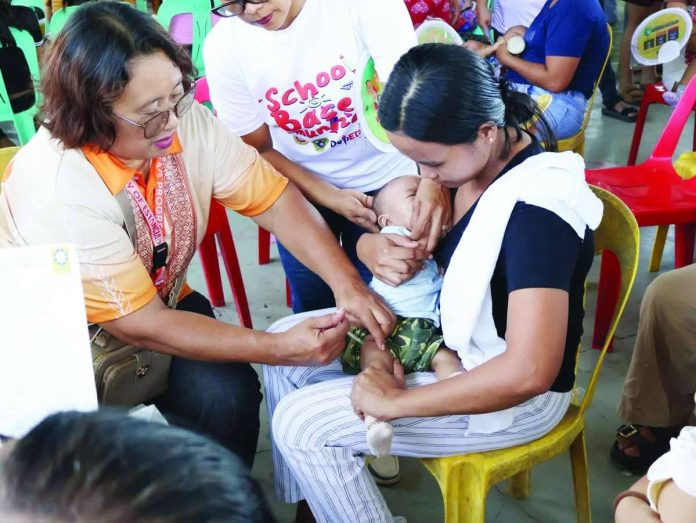 neljoy_measles_copy_compressed_resized A healthcare worker administers a measles-rubella vaccine to a young child during a community immunization activity. The Department of Health - Region 6, campaigning to protect children against the highly contagious diseases, is urging parents to have children aged six to 59 months vaccinated during the Measles-Rubella Supplemental Immunization Activity scheduled from Aug. 10 to 28, 2026, stressing that the vaccines are free, safe, and effective. DOH-6