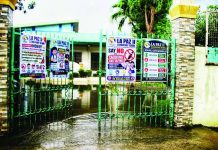 Floodwaters submerge areas surrounding La Paz II Elementary School in La Paz, Iloilo City on Tuesday, Aug. 18, 2026. Heavy downpours forced the suspension of face-to-face classes across the city. ALLEN ANIMAS/PN