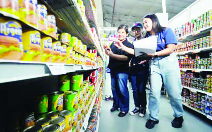 Personnel from the Department of Trade and Industry during a price inspection activity in Makati City on June 10, 2026. Results of the survey by Worldpanel by Numerator done in the first four months of 2026, and released on Aug. 14, 2026 showed that Filipinos have changed their spending habits pre-Middle East crisis and during the crisis to address commodity price developments, and have embraced online and discount stores to maximize their funds. PNA photo by Robert Oswald P. Alfiler
