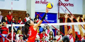 Caera Celis of the Philippines hammers the ball against the defense during the FIVB Volleyball Girls’ U17 World Championship in San Felipe, Chile. FIVB PHOTO