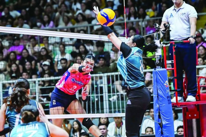 sports_Cool_copy_compressed_resized Creamline Cool Smashers’ Alyssa Valdez scores against Ilongga Aiza Maizo-Pontillas of Galeries Tower Highrisers during their PVL On Tour match at the Victorias City Coliseum in Negros Occidental. PVL PHOTO