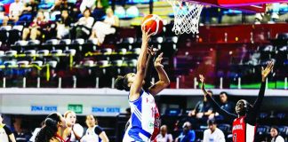 Gilas Pilipinas Women's Jack Animam attacks the Canada defense for an inside basket during their FIBA Pre-Olympic Qualifying Tournament clash in Guadalajara, Mexico. FIBA