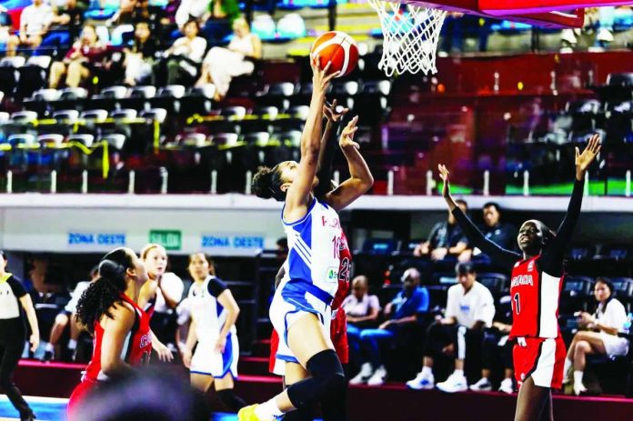 sports_Gilas_women_copy_compressed_resized Gilas Pilipinas Women's Jack Animam attacks the Canada defense for an inside basket during their FIBA Pre-Olympic Qualifying Tournament clash in Guadalajara, Mexico. FIBA