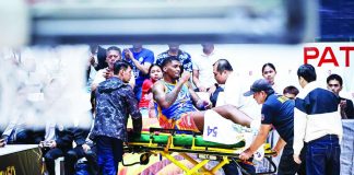 NLEX Road Warriors import DeQuan Jones is stretchered out after suffering a severe lower-leg eversion following a collision with TNT center Brandon Ganuelas-Rosser during their PBA Governors’ Cup game at the Ynares Center in Antipolo City. PBA PHOTO