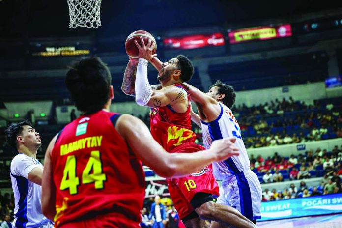 sports_PBA_compressed_resized Rain or Shine import Aaron Fuller powers his way inside against Meralco’s Brandon Bates before hitting the game-winning basket that capped the Elasto Painters' comeback 85-83 victory and fourth straight win in the PBA Season 50 Governors' Cup. PBA PHOTO