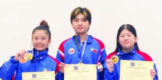 Willa Galvez, Victoria Ebdane and Jodie Tan of Philippine Team A proudly display their gold medals after ruling the junior women’s team foil event of the 2026 Southeast Asian Fencing Federation Cadet and Junior Championship in Kuala Lumpur, Malaysia. PHOTO COURTESY OF MARIA ELLEN CAMPOS PALAFOX