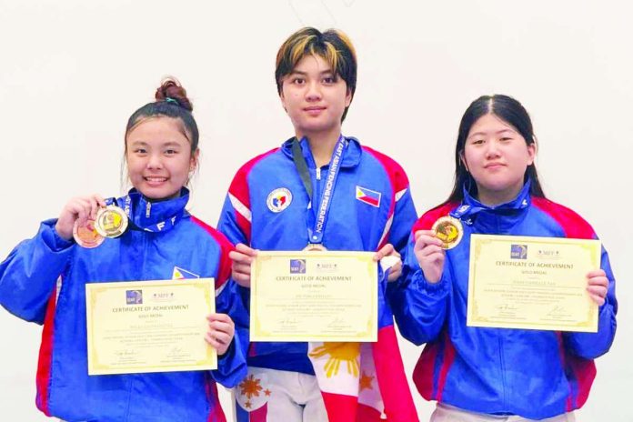 sports_PH_fencers_compressed_resized Willa Galvez, Victoria Ebdane and Jodie Tan of Philippine Team A proudly display their gold medals after ruling the junior women’s team foil event of the 2026 Southeast Asian Fencing Federation Cadet and Junior Championship in Kuala Lumpur, Malaysia. PHOTO COURTESY OF MARIA ELLEN CAMPOS PALAFOX