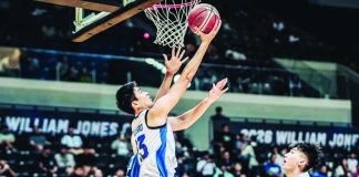 Strong Group Athletics-Pilipinas’ William Navarro goes for a reverse basket against the defense of Chinese Taipei Blue during their 2026 William Jones Cup encounter in New Taipei City, Taiwan. SGA