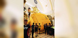Emergency responders rescue a man who climbed onto the altar area of San Sebastian Cathedral in Bacolod City on September 26, 2026. Responders placed an inflatable jump cushion below the elevated area, where the man safely landed. BFP-BACOLOD PHOTO