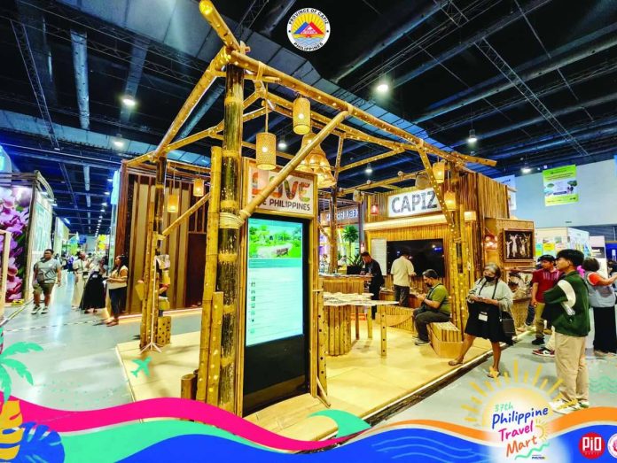 Capiz_booth_copy_compressed_resized The Capiz Provincial Government showcased its “Balay Kawayan” booth during the 37th Philippine Travel Mart at the SMX Convention Center, highlighting the province’s cultural heritage, sustainable practices, local products and digital tourism initiatives. The booth features a shell-crafted map of Capiz and bamboo-inspired elements reflecting the province’s identity and vision for NextGen tourism. CAPIZ PROVINCIAL GOVERNMENT