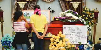 Relatives and friends attend the wake of murdered environmentalist Juan Lopez in Tocoa, Honduras, on September 15, 2024. López was one of the environmentalists killed in Latin America recent years. The anti-mining activist was shot in Honduras in 2024. ORLANDO SIERRA/AFP VIA GETTY IMAGES