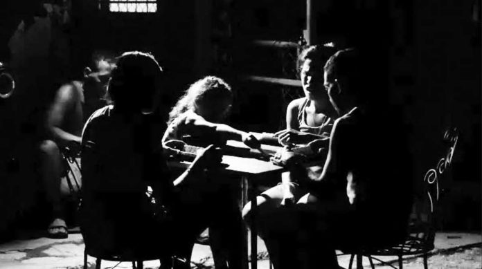 Cuba_compressed_resized People play dominoes in a dark outdoor space during a blackout in Havana. EPA/Shutterstock