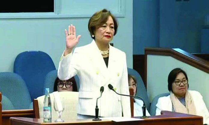 Retired Sandiganbayan presiding justice Amparo Cabotaje-Tang takes her oath as the prosecution’s first witness for Article II of the Articles of Impeachment against Vice President Sara Duterte. INQUIRER