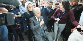 Lenin Moreno, former president of Ecuador, leaves the National Court of Justice during a corruption case in Quito. GETTY IMAGES