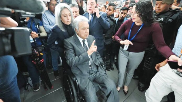 Lenin Moreno, former president of Ecuador, leaves the National Court of Justice during a corruption case in Quito. GETTY IMAGES