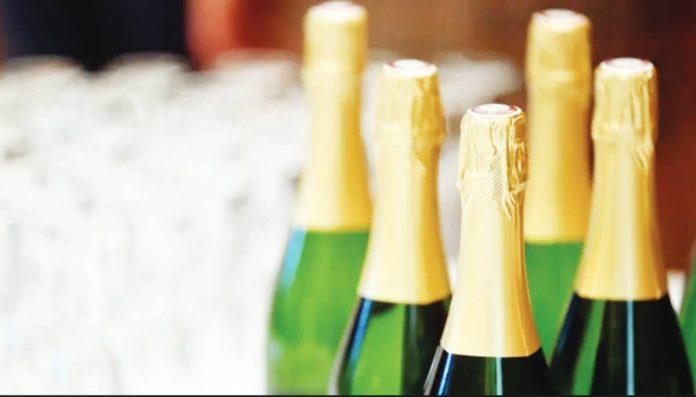 Winemakers can temporarily produce champagne with an alcohol content of up to 15% - above the 13% cap, industry officials in France have said. GETTY IMAGES