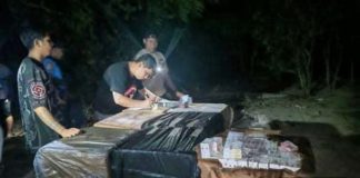 Authorities document the suspected smuggled cigarettes worth approximately P10.2 million seized during a joint law enforcement operation in Himamaylan City, Negros Occidental, on September 28, 2026. One suspect was arrested, while two others remain at large. PRO-NIR PHOTO