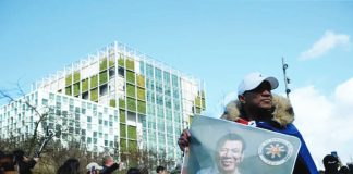 Supporters of former president Rodrigo Duterte gather outside the International Criminal Court in The Hague, Netherlands where he is accused of crimes against humanity for the thousands killed in his drug war. AFP