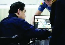 Former House speaker Martin Romualdez is seen inside a room in the Bureau of Jail Management and Penology on Wednesday morning as he waits to attend his arraignment for plunder charges via teleconference.