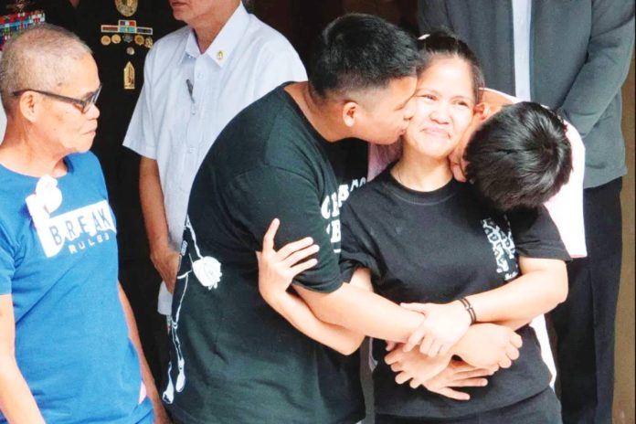 Nation_Veloso_copy_resized Mary Jane Veloso (second from right) is reunited with her two sons and her father (left) after she arrived at the Correctional Institution for Women in Manila on December 18, 2024 from Indonesia where she had been convicted for drug trafficking. The Indonesian government agreed to her repatriation despite her death sentence. AFP