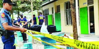 Police secure the campus of Banga National High School in South Cotabato following a shooting allegedly involving a Grade 9 student who managed to sneak in a gun belonging to his father. PHILIPPINE DAILY INQUIRER, AMIEL CAGAYAN