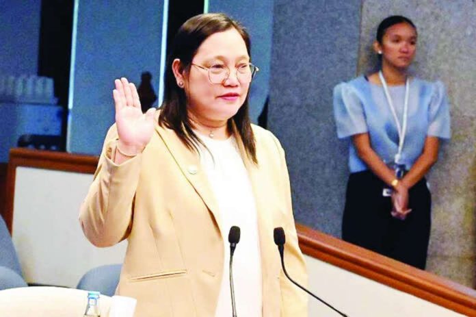 PSA_confi_copy_compressed_resized Philippine Statistics Authority’s Assistant National Statistician Marizza Grande takes her oath before the Senate impeachment court on the 22nd day of the impeachment trial of Vice President Sara Duterte-Carpio at the Senate in Pasay City. SPPA POOL/LINO SANTOS