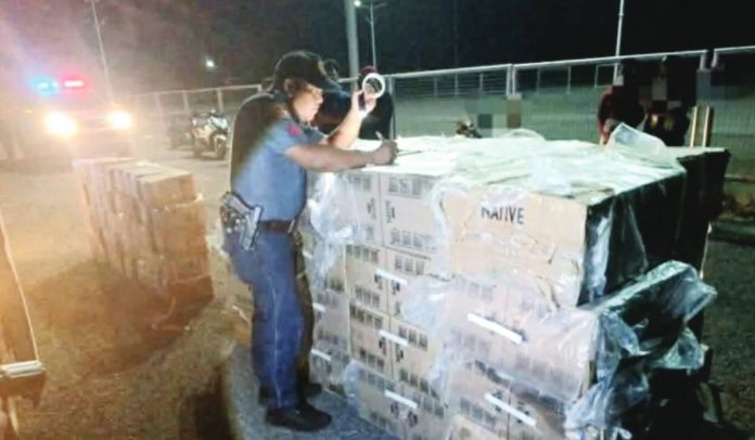 Authorities seized P1.98 million worth of suspected smuggled Native cigarettes reportedly brought from Cebu after intercepting the shipment at the San Carlos Seaport in Barangay 6, San Carlos City, Negros Occidental, on August 31. NEGOCC PPO PHOTO