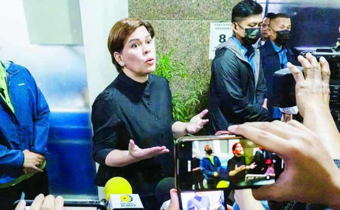 Vice President Sara Duterte arrives at the Quezon City Hall of Justice on Saturday, September 5, 2026, to post bail following an arrest warrant issued by Quezon City Regional Trial Court Branch 98. INQUIRER PHOTO/GRIG C. MONTEGRANDE