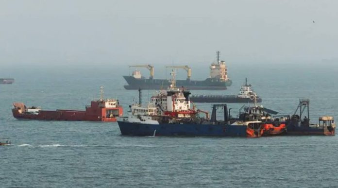 Saudi Commercial ships are anchored in the Strait of Hormuz, off the coast of Bandar Abbas, Iran. The strait has effectively been closed since the start of the war in Iran. GETTY IMAGES