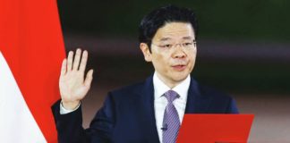 Singapore Prime Minister Lawrence Wong says pay raise is necessary to attract talent. GETTY IMAGES