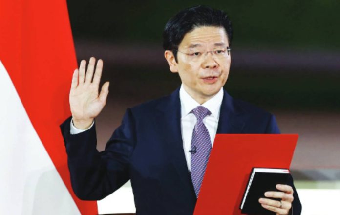 Singapore Prime Minister Lawrence Wong says pay raise is necessary to attract talent. GETTY IMAGES